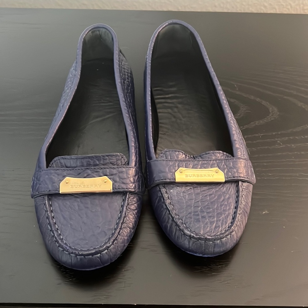 Burberry | Navy leather women’s loafers.